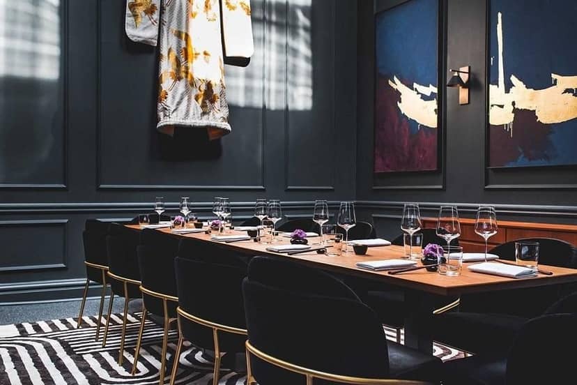 Elegant private dining room with stylish decor for exclusive events and meetings.