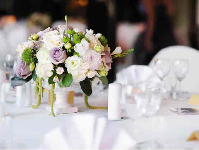 Elegant floral centerpiece for upscale events and weddings at San Jose Gallery.
