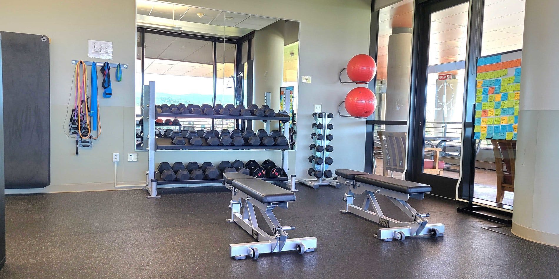 Arrillaga Center fitness area with weights, ideal for wellness events and retreats.
