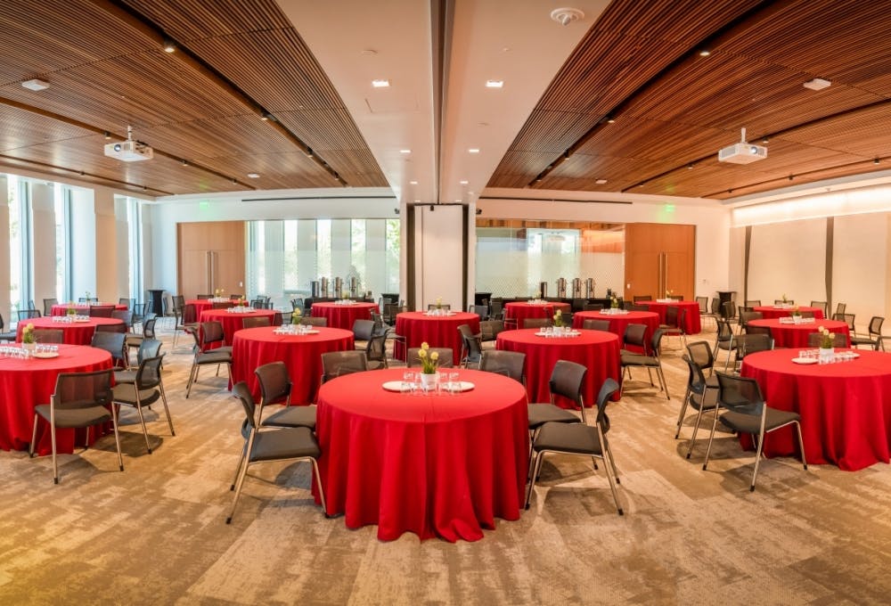 Stanford Conference Center with red tablecloths, perfect for events and workshops.