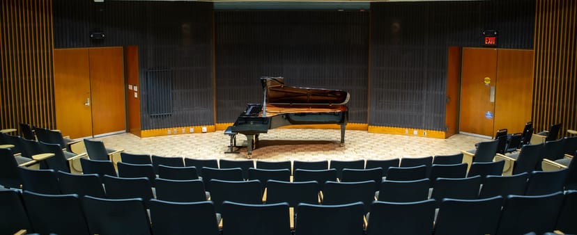 Campbell Recital Hall with grand piano, ideal for intimate concerts and recitals.