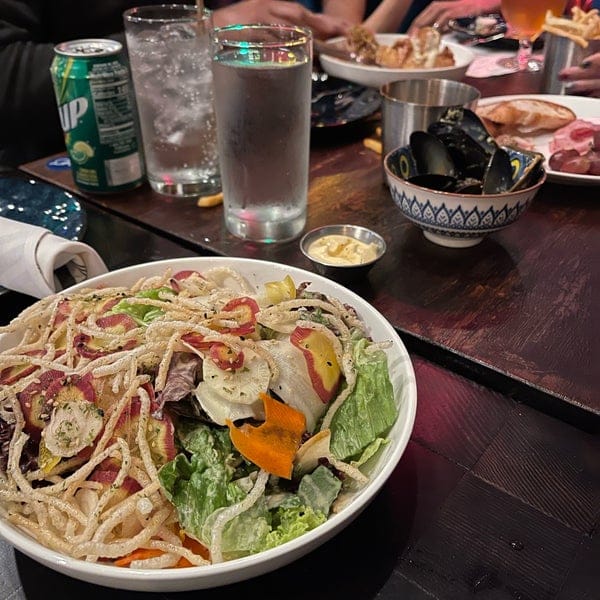 Vibrant salad at Sidecar Bar & Lounge for catered event dining experience.