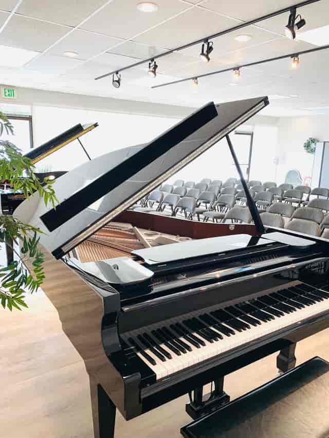 Master Class rehearsal with grand pianos in elegant Silicon Valley event space.