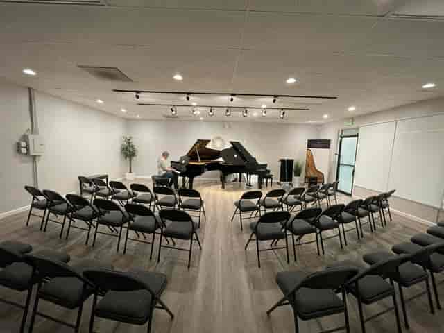 Intimate event space with grand piano for performances and meetings in Silicon Valley.
