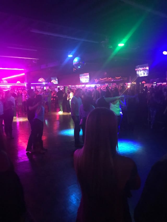 Vibrant nightclub scene at Club Rodeo Rio, perfect for networking and celebrations.
