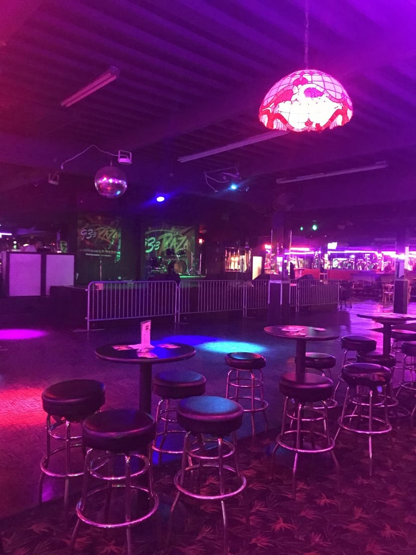 Vibrant nightclub at Club Rodeo Rio with disco ball, perfect for events and parties.