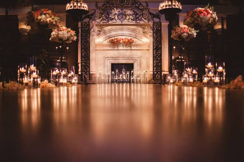 Elegant event space with fireplace, ideal for weddings and upscale gatherings.