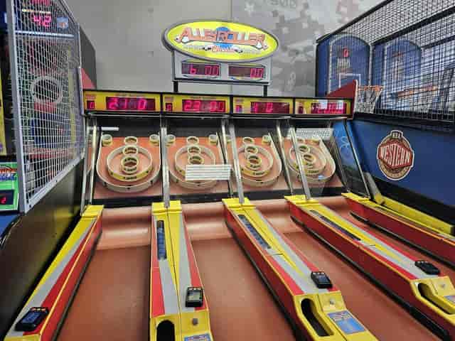 Vibrant skee-ball arcade at Chuck E. Cheese Newark for fun events and networking.