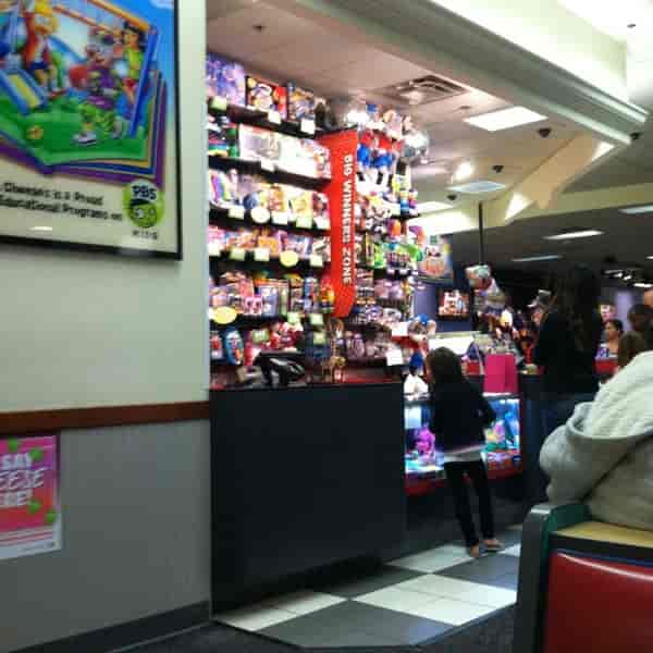 Colorful trampoline zone at Chuck E. Cheese Newark for kids' parties and family events.