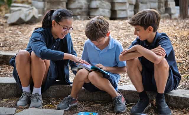 Children collaborating outdoors in Fisher Event Center, ideal for workshops and team-building.