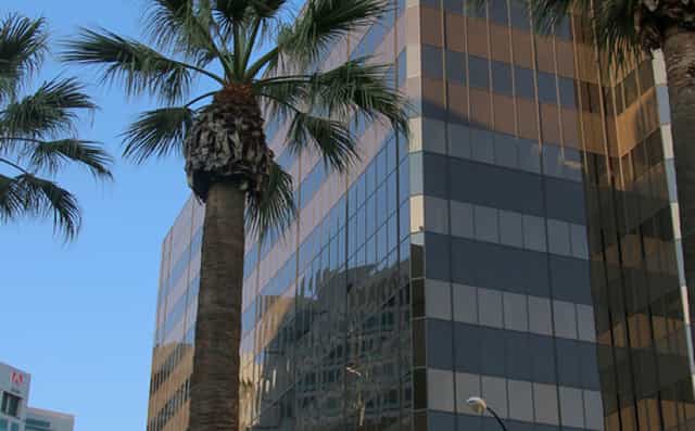 Modern office building Suite 600 with reflective glass, ideal for corporate events.