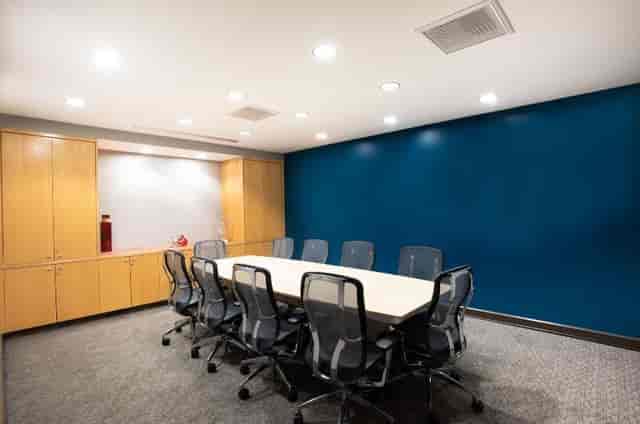 Modern conference room with ergonomic chairs in Legacy Hamilton Plaza for effective meetings.
