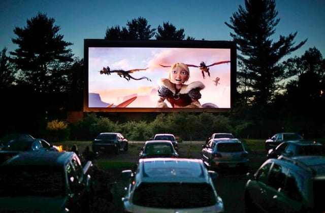 San Jose Drive-In outdoor movie screening with large screen for family-friendly events.