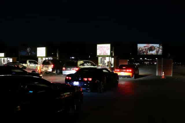 San Jose Drive-In setup with illuminated screens for safe outdoor movie nights.