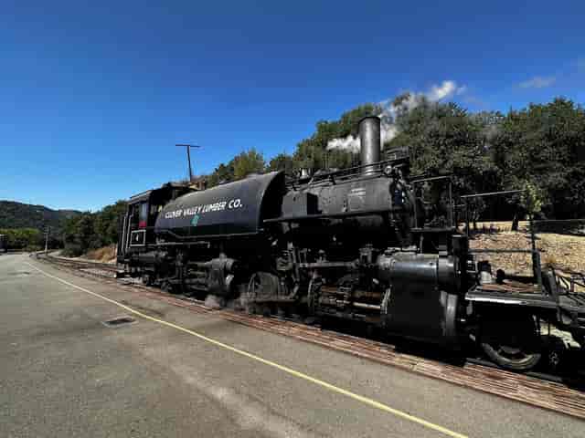 Vintage steam locomotive in Sunol's Casa Bella Main Ballroom for unique events.