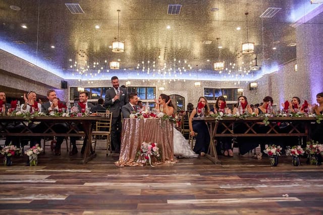 Elegant banquet hall reception at Casa Bella, featuring floral centerpieces for weddings.