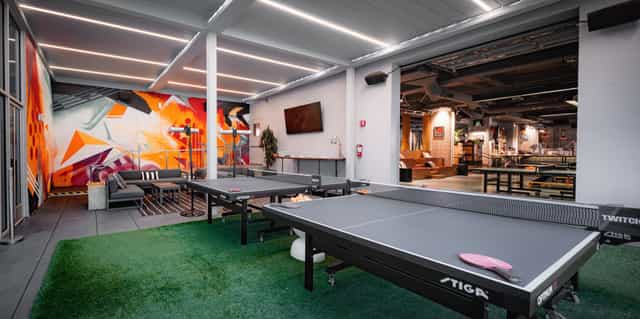 Modern event space with ping pong tables for casual meetings in San Francisco.