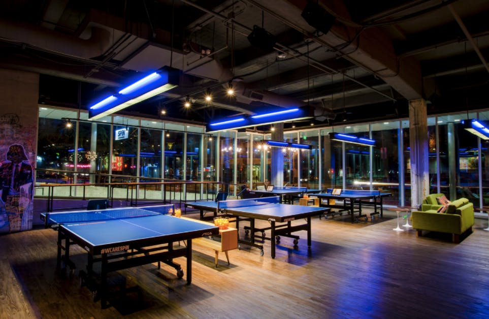 Vibrant SPIN San Francisco event space with ping pong tables for networking and team-building.