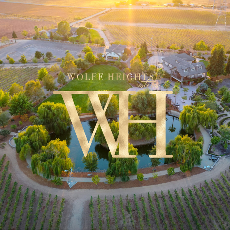 Tavern Bar at Wolfe Heights Winery, elegant venue for events with lush greenery and pond.