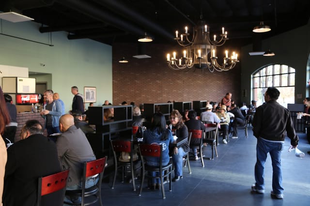 Event space at Sophie's Mediterranean Grill, warm lighting, networking and meetings.