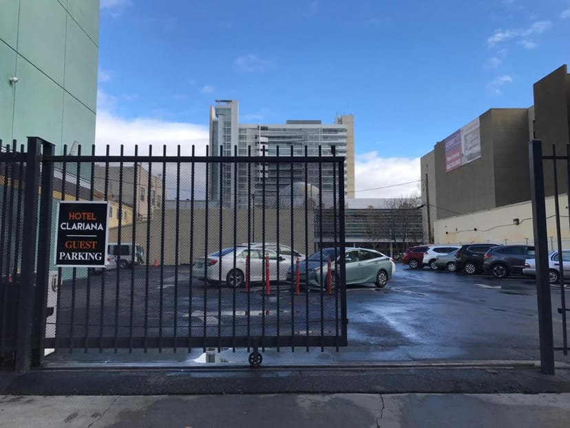 Gated parking at Hotel Clariana, ideal for events and meetings in good weather.