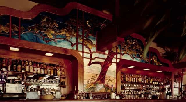 Vibrant bar with mural at Number 1 Broadway, ideal for networking events and gatherings.