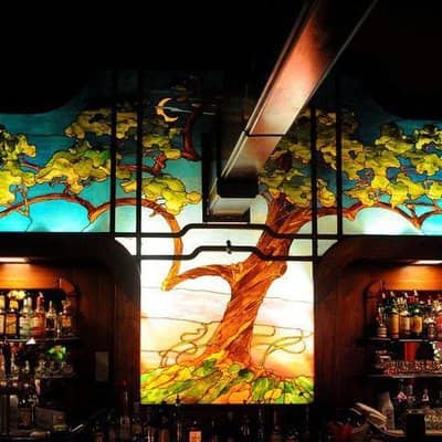 Vibrant Main Room at Number 1 Broadway with tree design, perfect for events and gatherings.