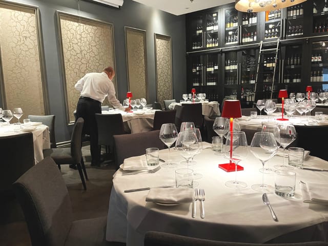 Private dining room in Modus with elegant tables for upscale events and private dinners.