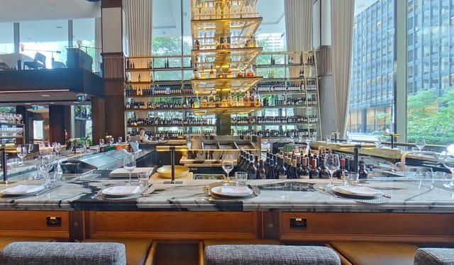 Elegant dining space in The Gold Room, ideal for upscale events and networking receptions.
