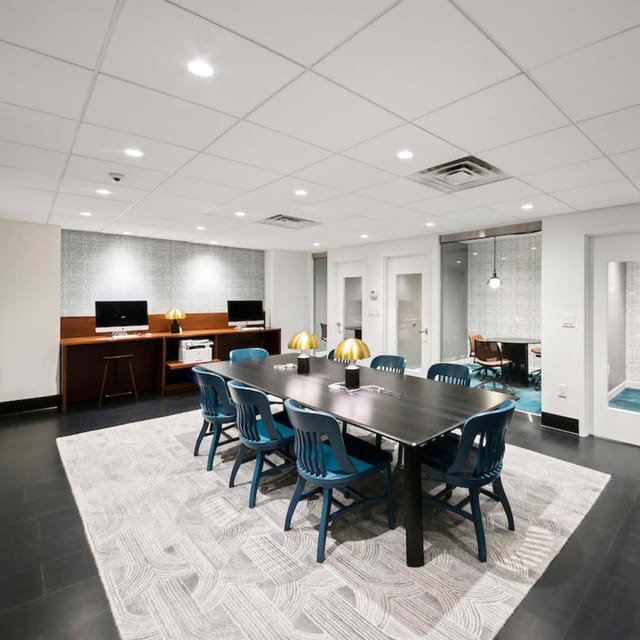 Modern meeting room in NYC's Financial District, ideal for presentations and collaboration.