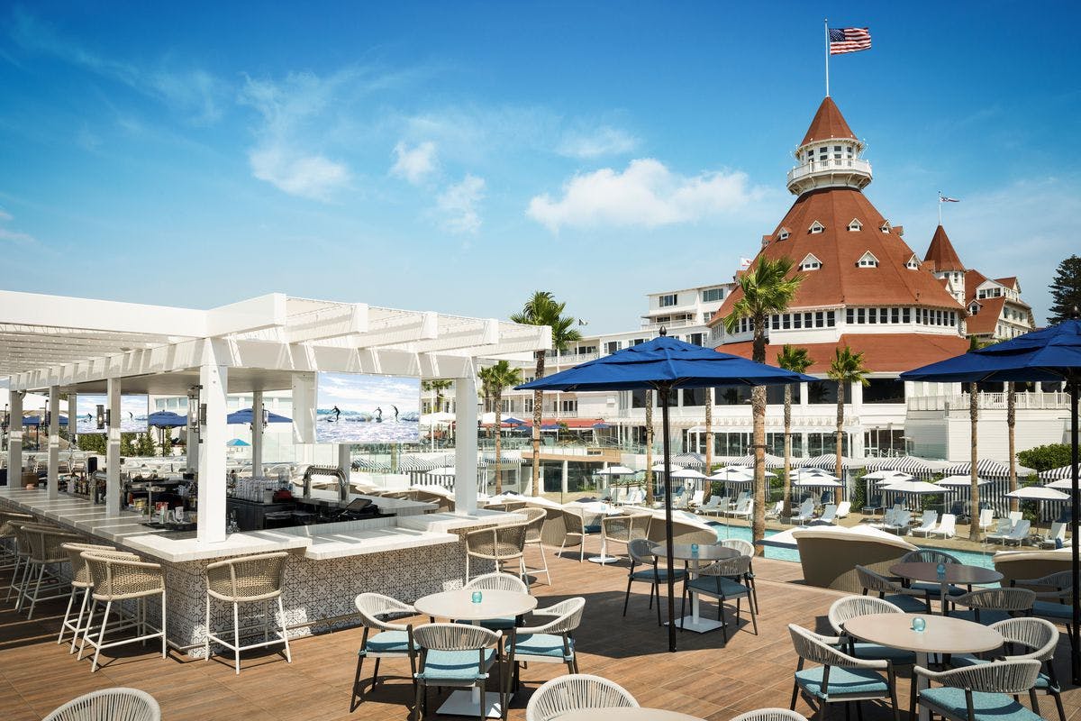 Outdoor event venue at Serea Coastal Cuisine with stylish bar and waterfront views.