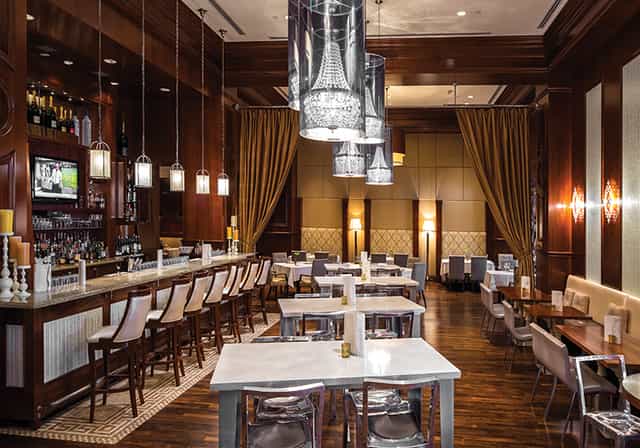 Elegant Grant Grill Lounge with warm lighting, ideal for corporate dinners and private events.