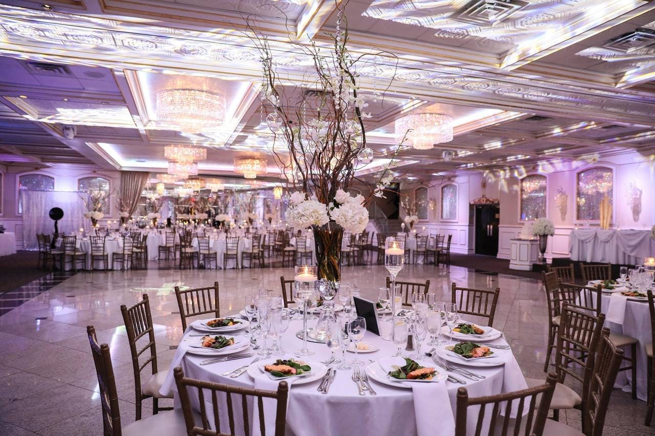 Elegant Grand Ballroom with chandeliers, perfect for weddings and corporate galas.