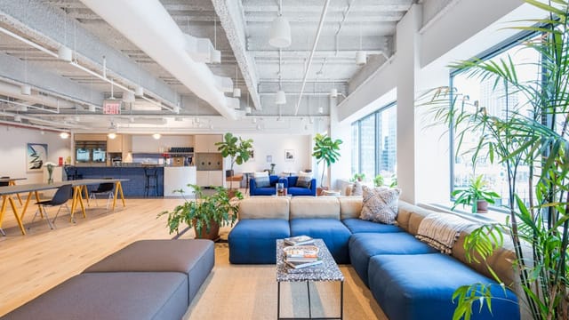 Modern conference room with natural light, ideal for networking events and meetings.