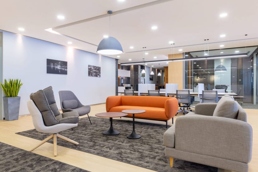 Modern lounge area in HQ Newark, ideal for networking and informal meetings.