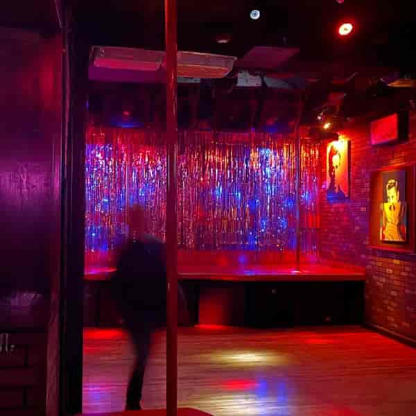 Vibrant B66 Club seating area with colorful lighting for themed parties and nightlife events.