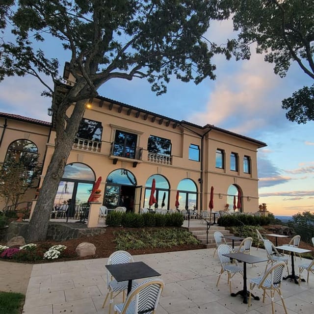 Elegant Highlawn patio venue with large windows for meetings and receptions.