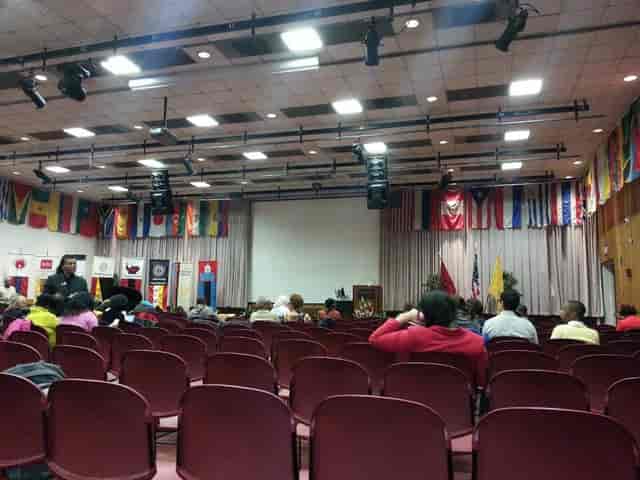 Paul Robeson Campus Center auditorium with empty chairs, ideal for conferences and cultural events.