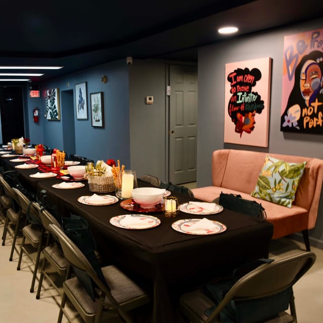 Private workspace in Creator's Village Newark, elegant dining table for networking events.