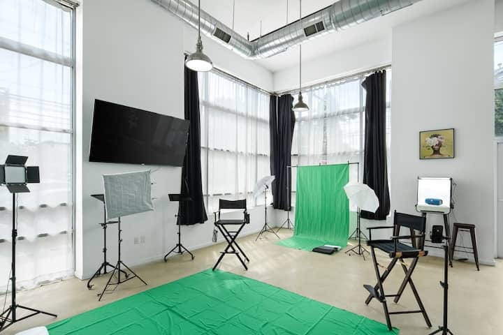 Private workspace with green screen for hybrid meetings and video production in Newark.