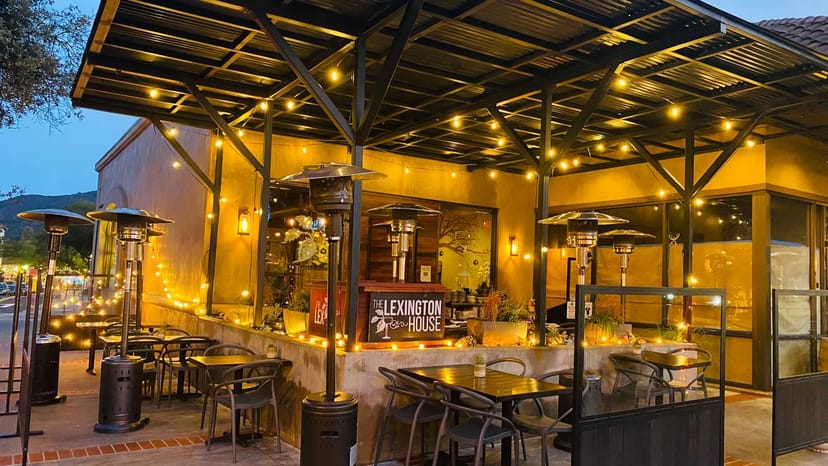 Charming outdoor dining area at The Lexington House for intimate events and receptions.