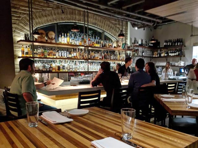 Main Dining Area at The Lexington House, stylish bar for networking events and gatherings.
