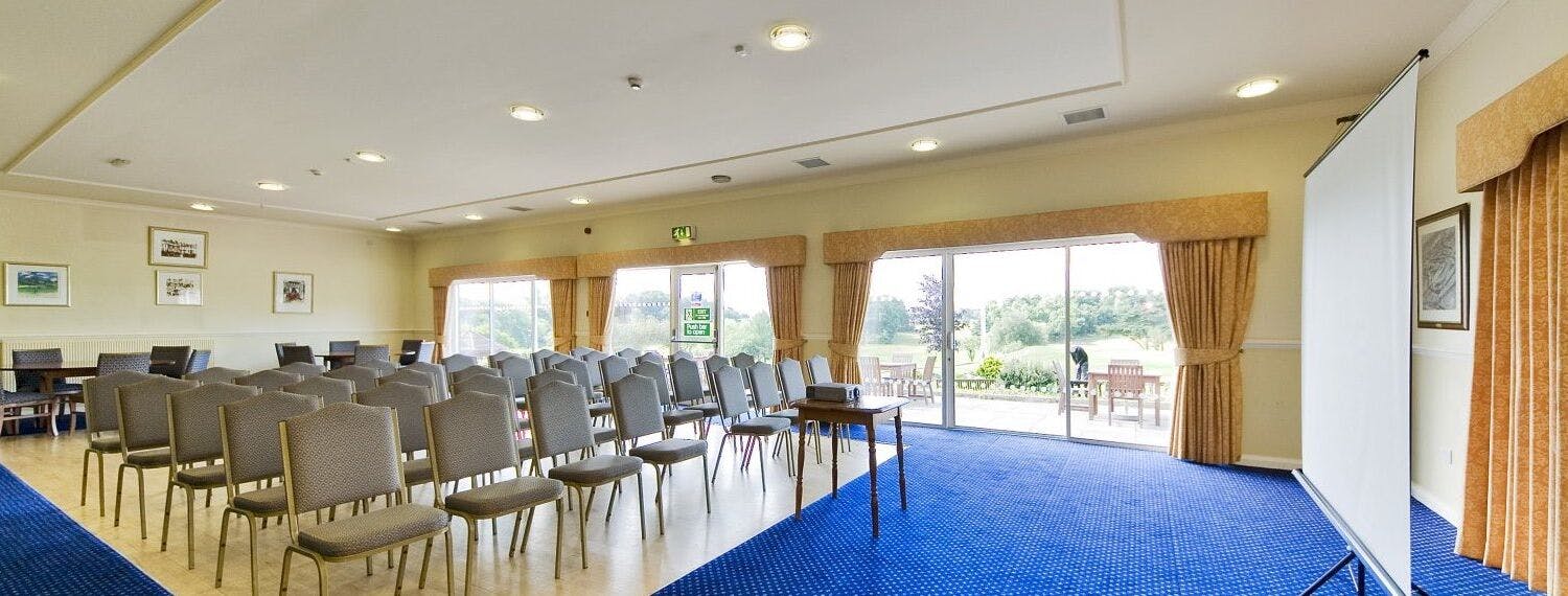 Function room at Harborne Golf Club, ideal for seminars and workshops with natural light.