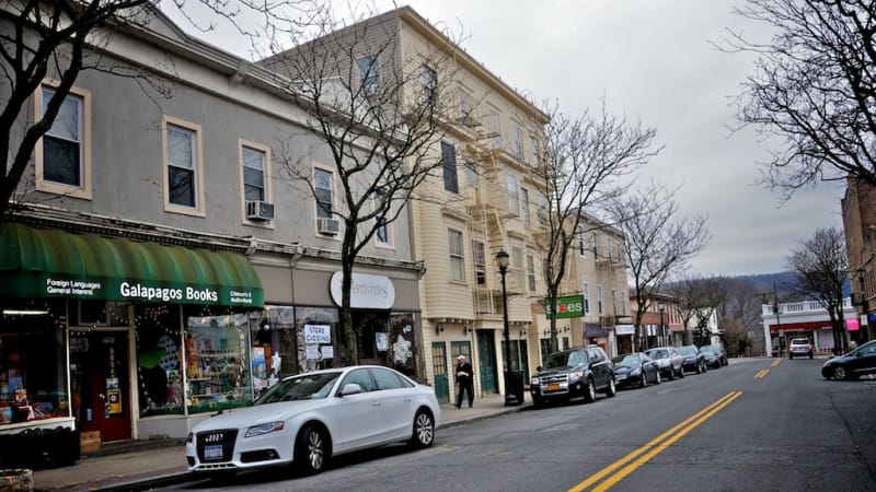 VFW Plaza in Hastings-on-Hudson, charming storefronts for community events and gatherings.