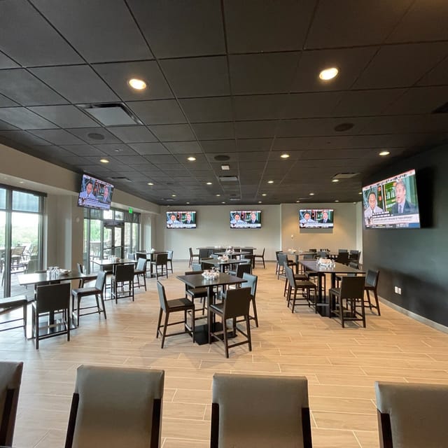Versatile event space at The Hill Tavern with modern decor for meetings and gatherings.