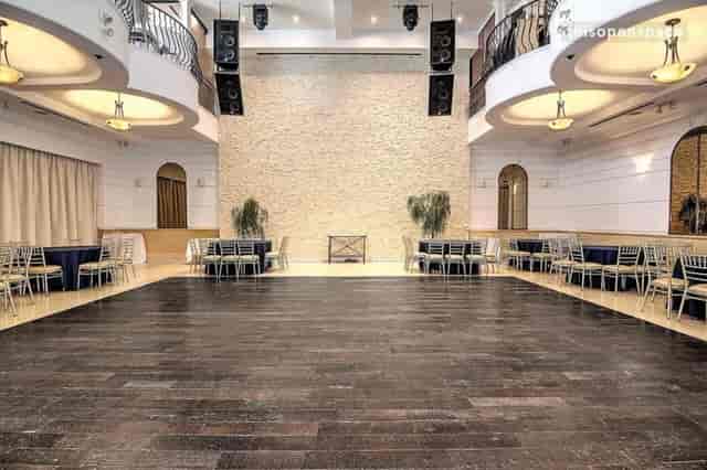 Spacious Renaissance Event Hall balcony with polished wood floor, ideal for gatherings.