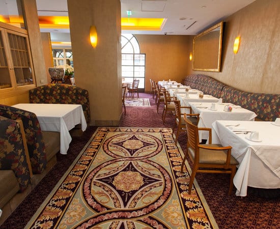 Daffodil Restaurant dining area with elegant tables, ideal for networking breakfasts and private luncheons.