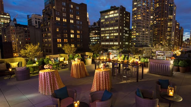 Rooftop event space at Kimpton Hotel Eventi, perfect for evening gatherings and urban events.