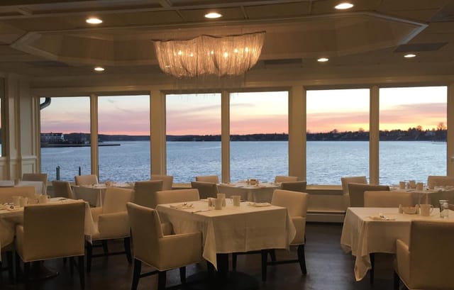 Elegant dining area in South Suite, Oyster Point Hotel, perfect for upscale events.