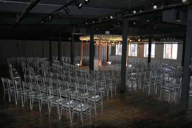 Spacious Factory220 venue with chiavari chairs for elegant private parties and conferences.
